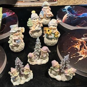 7 piece lot . 4 Snowman Figurines with Pastel Accents and 3 Home Interiors . EUC